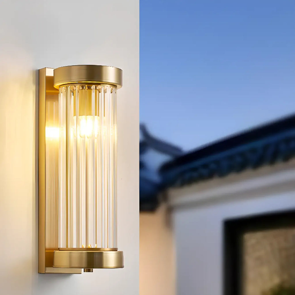 Modern Outdoor Cylinder Wall Sconce with Clear Shade