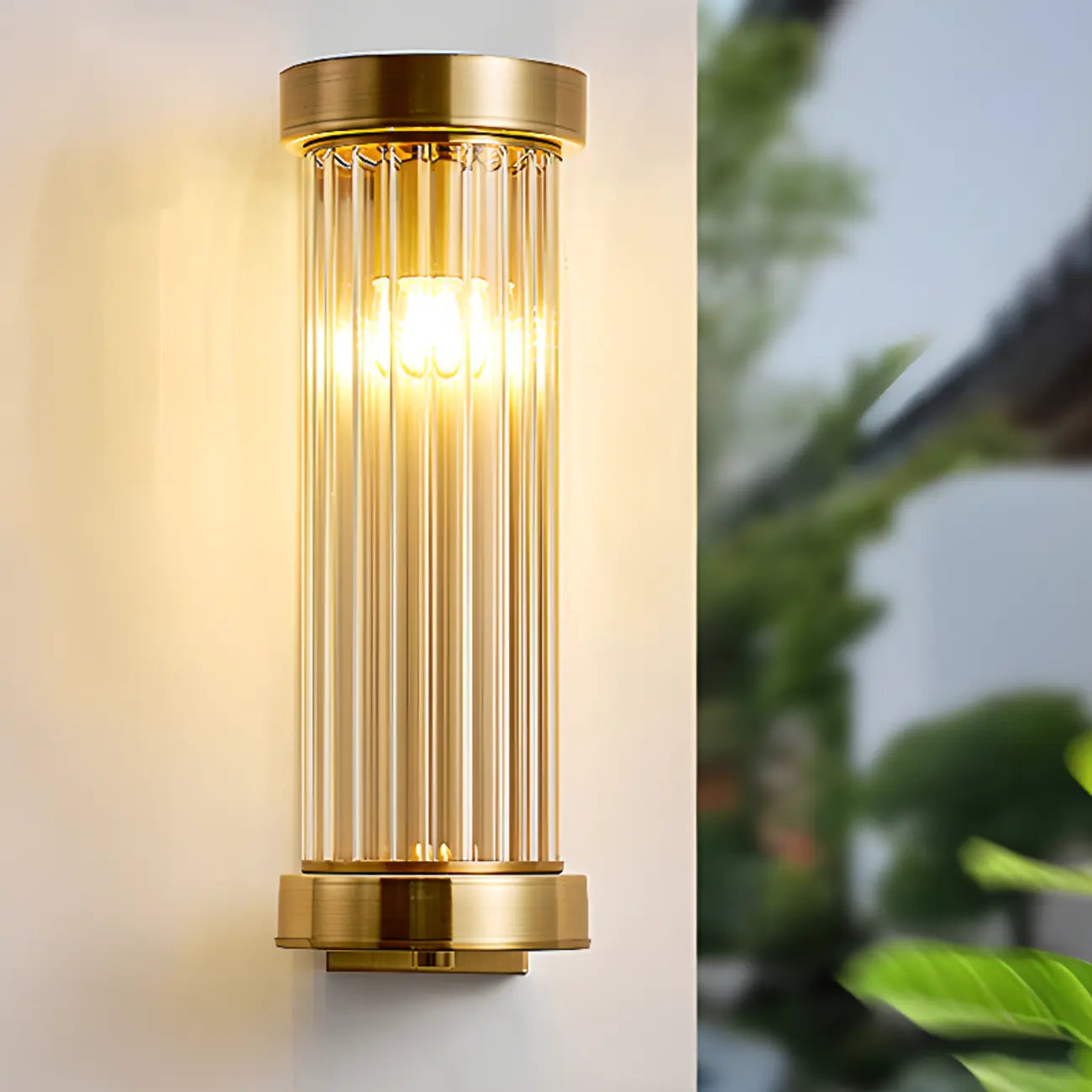 Modern Outdoor Cylinder Wall Sconce with Clear Shade