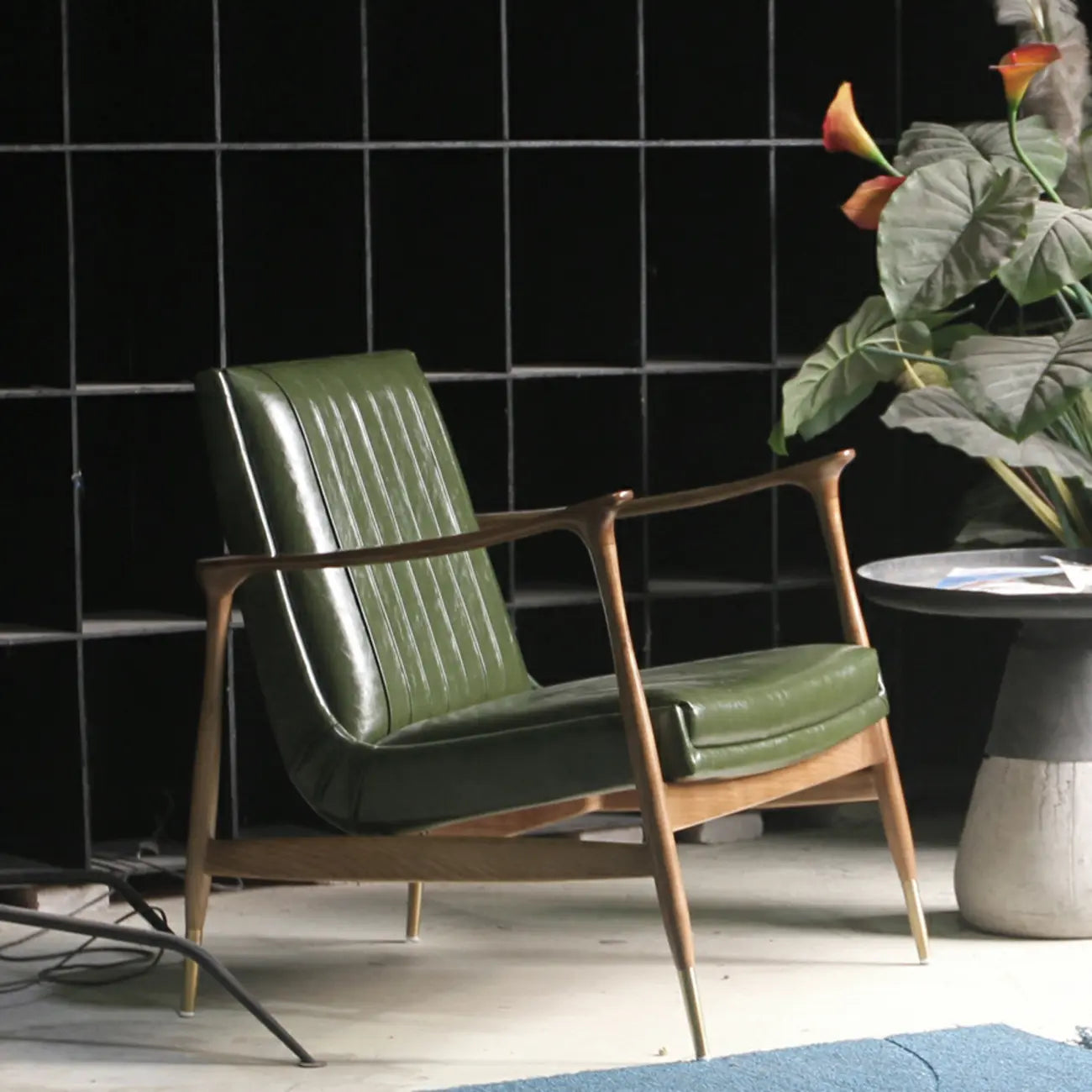 Modern Green Leather Armchair with High Back Design