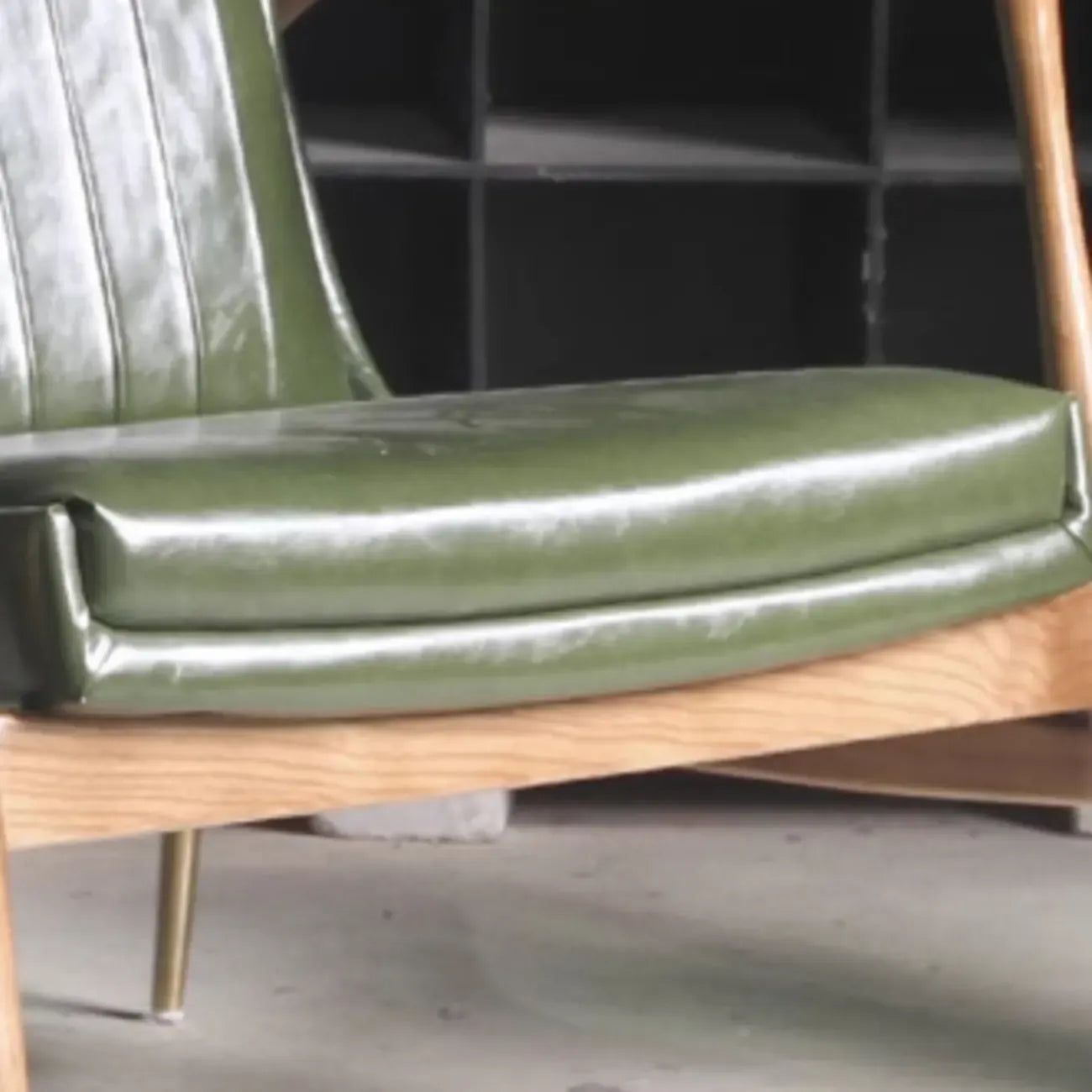 Modern Green Leather Armchair with High Back Design