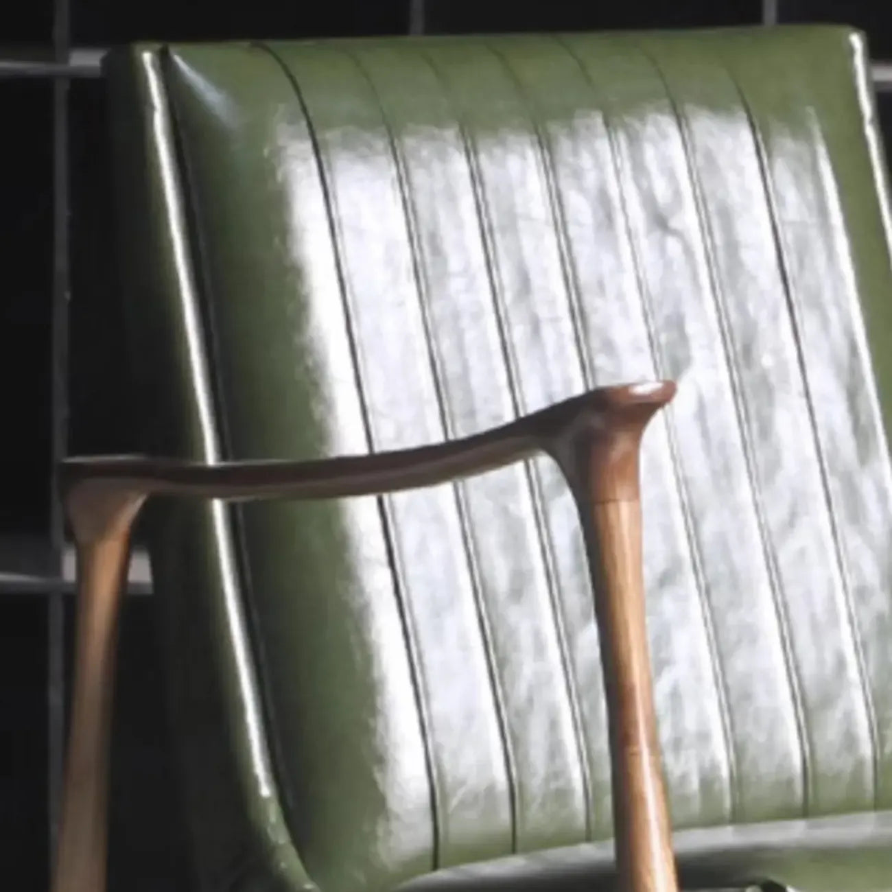 Modern Green Leather Armchair with High Back Design